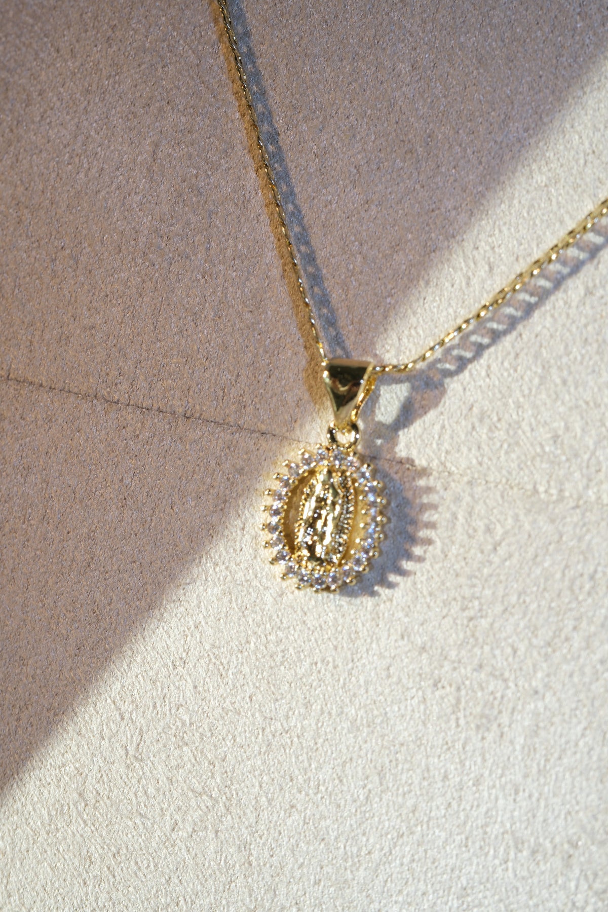 Oval Medallion Pendant — Gold — edited real-life photo
