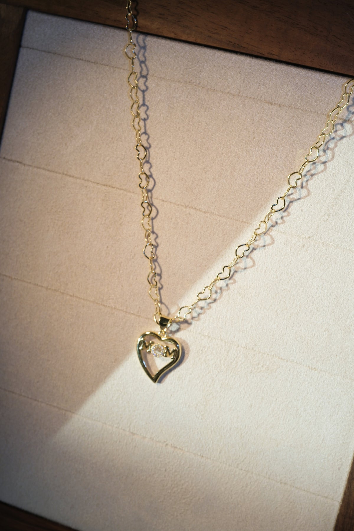 Mom Heart Pendant — Gold — edited real-life photo