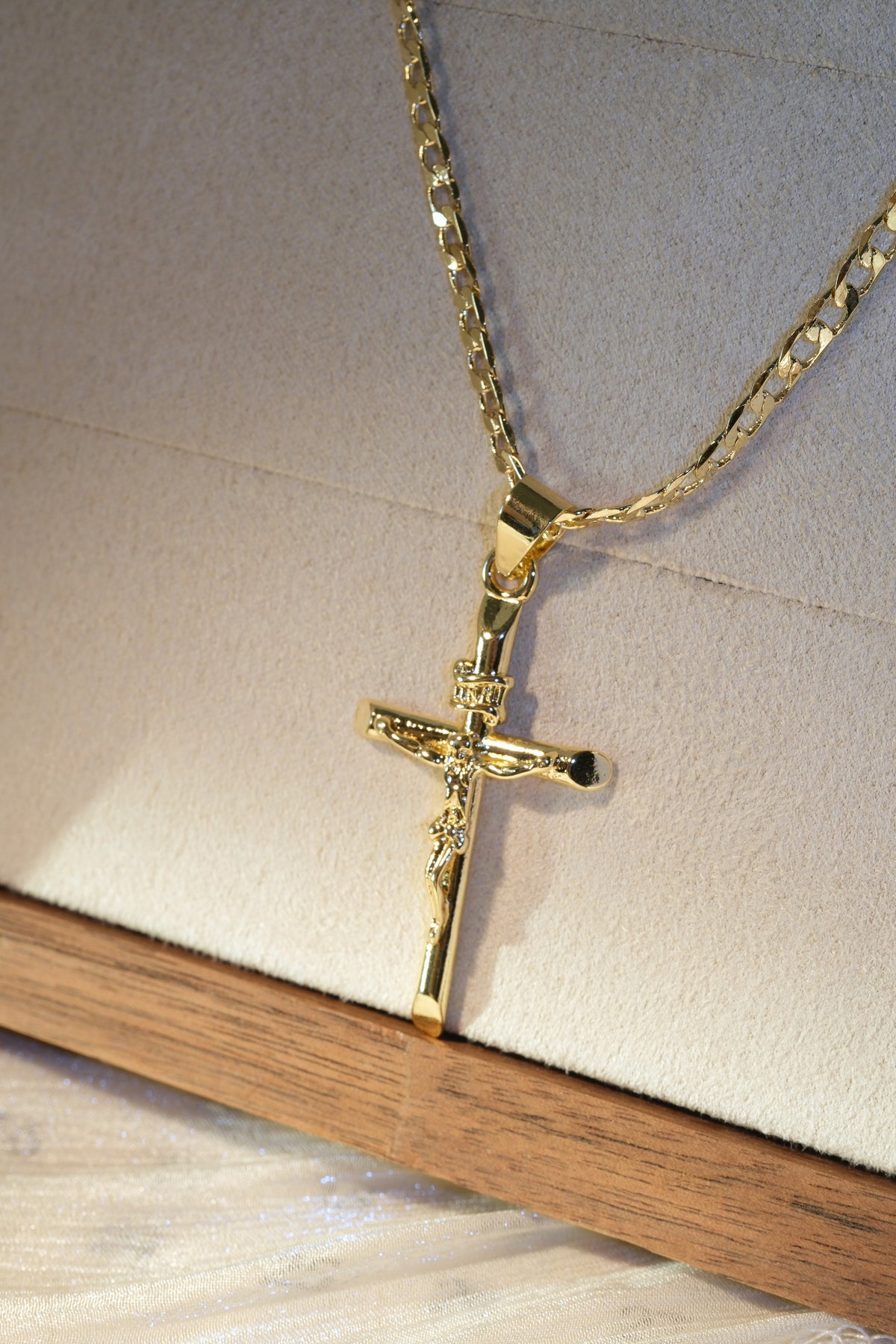 Long Crucifix Pendant — Gold — edited real-life photo