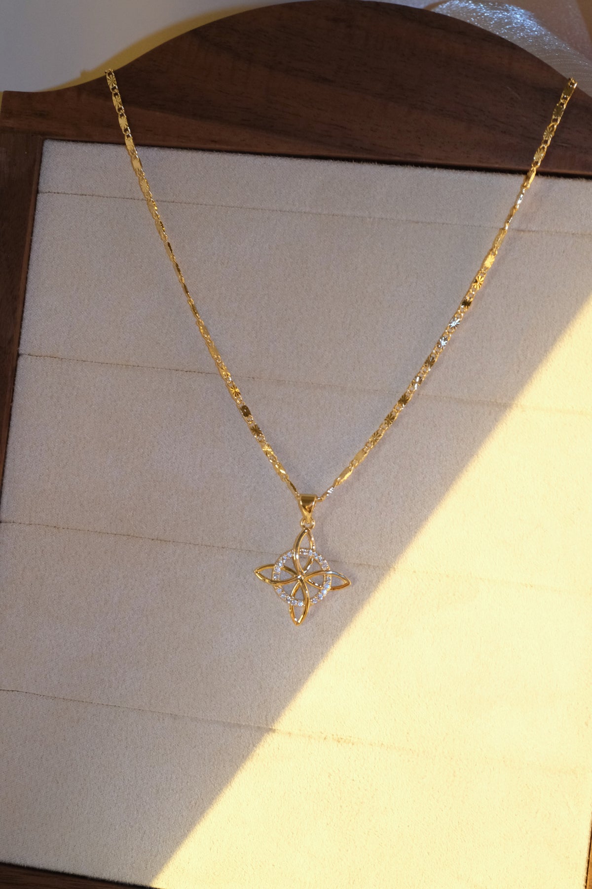 Four Point Flower Pendant — Gold — edited real-life photo
