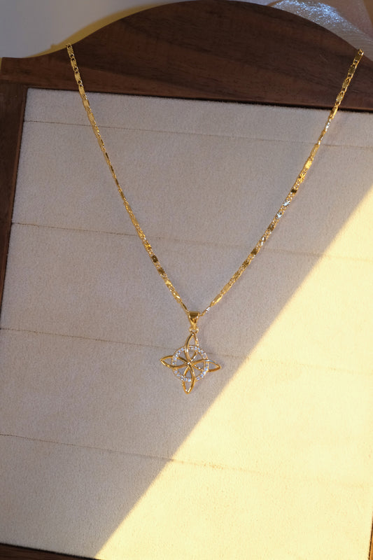Four Point Flower Pendant — Gold — edited real-life photo
