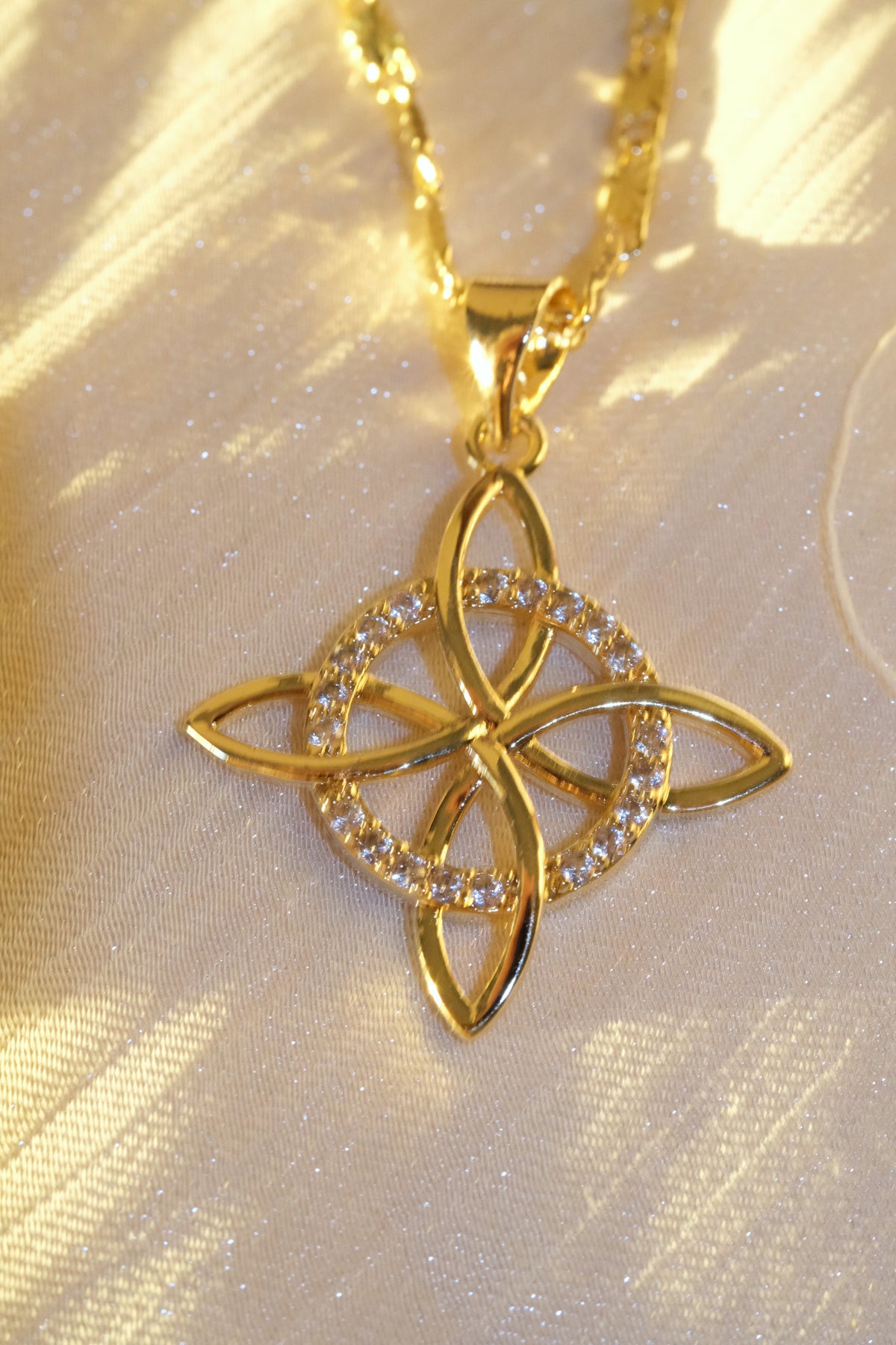 Four Point Flower Pendant — Gold — edited real-life photo