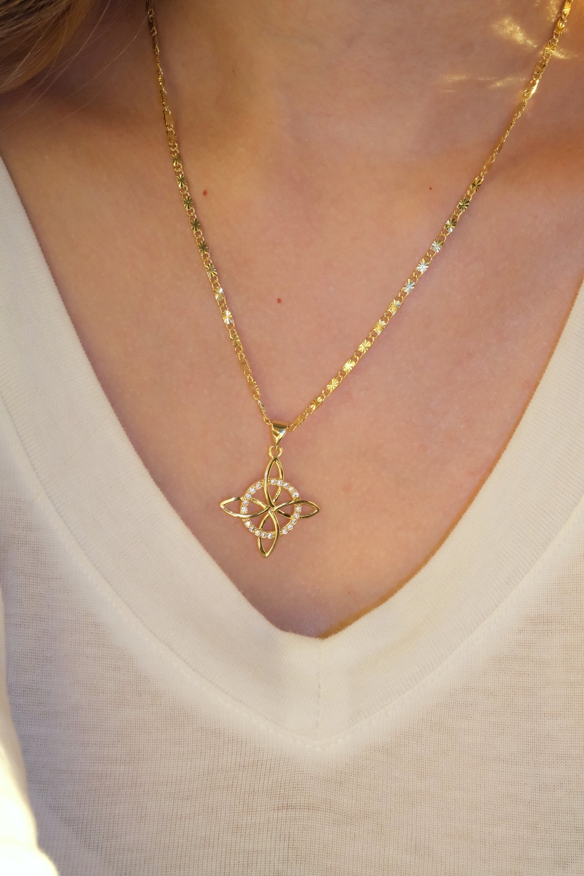 Four Point Flower Pendant — Gold — edited real-life photo