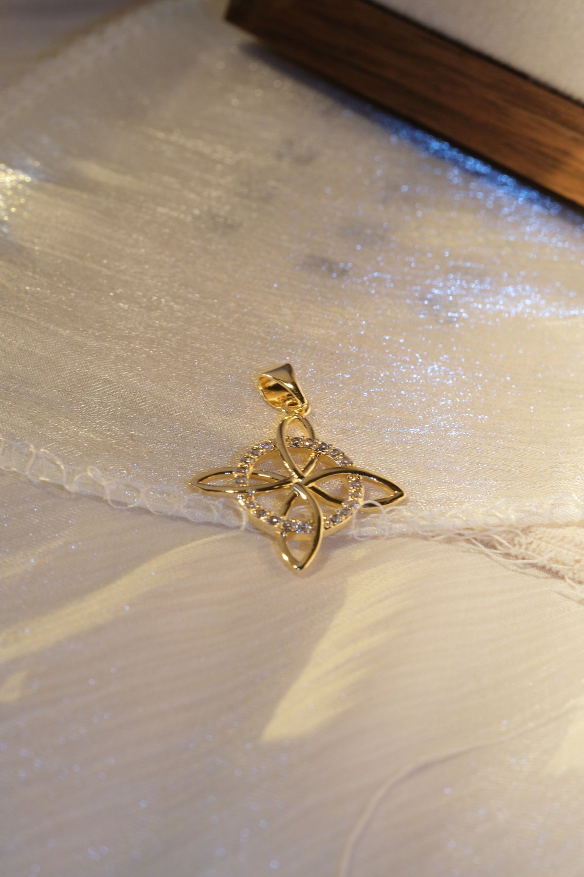 Four Point Flower Pendant — Gold — edited real-life photo