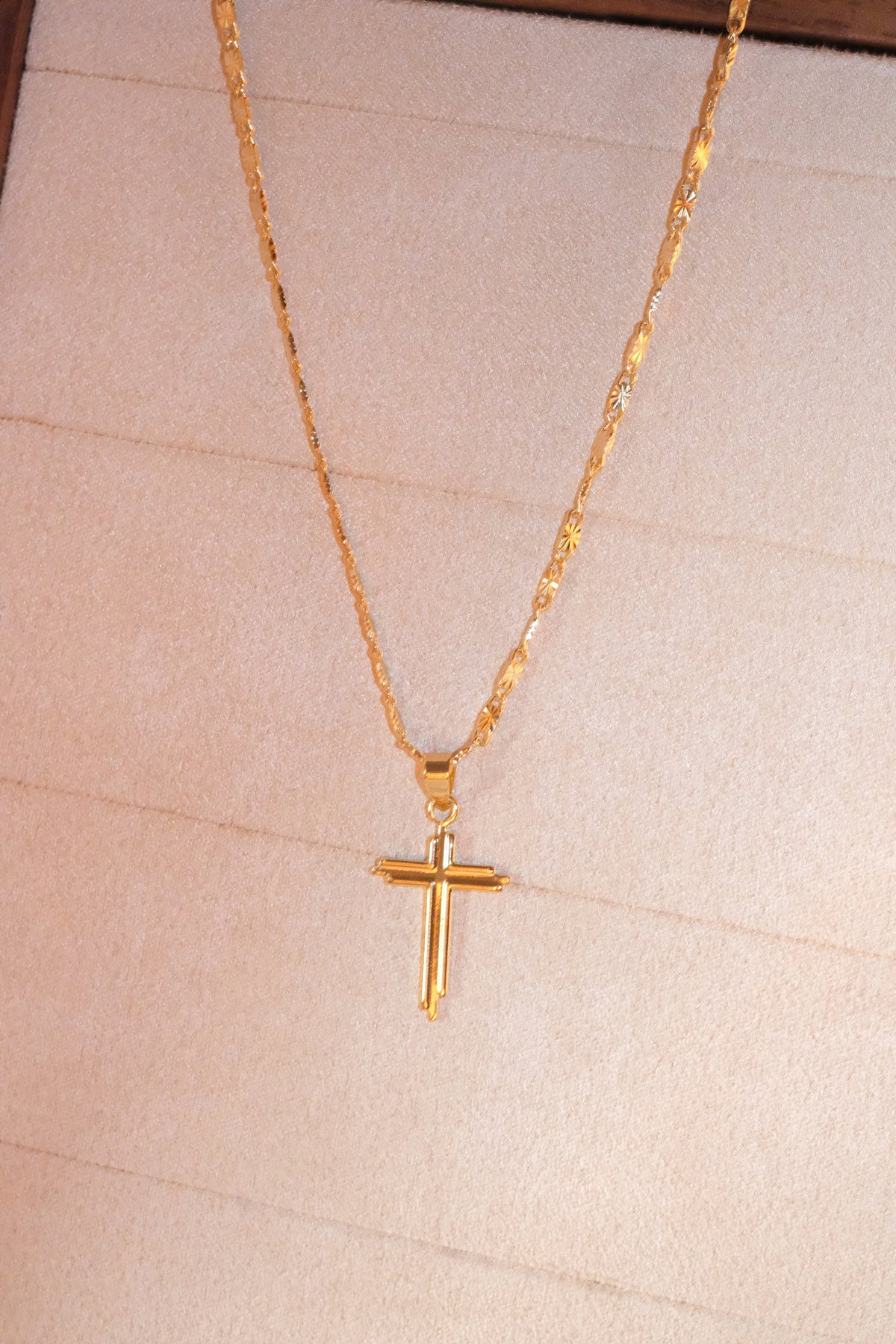 Slim Polished Cross Pendant — Gold — edited real-life photo