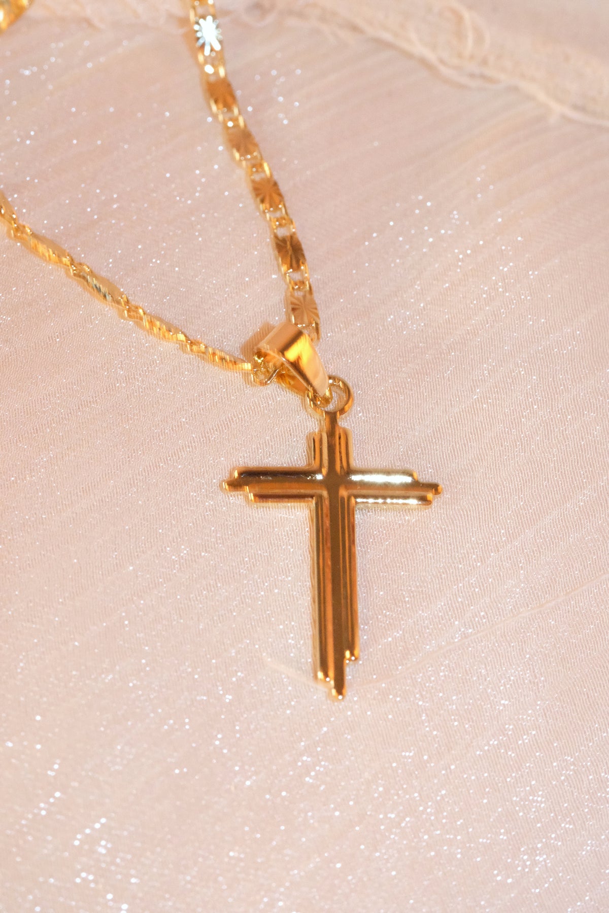 Slim Polished Cross Pendant — Gold — edited real-life photo