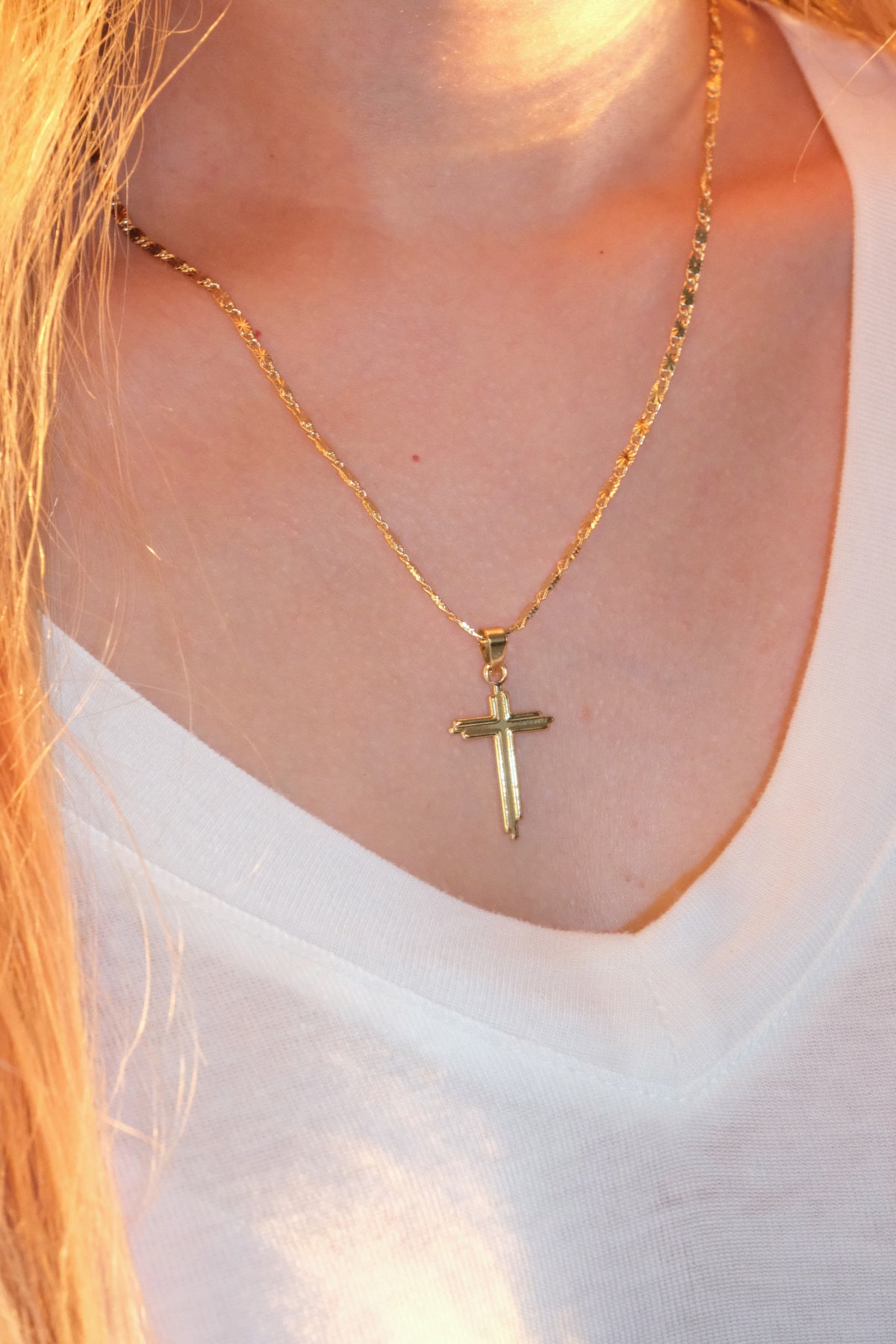 Slim Polished Cross Pendant — Gold — edited real-life photo