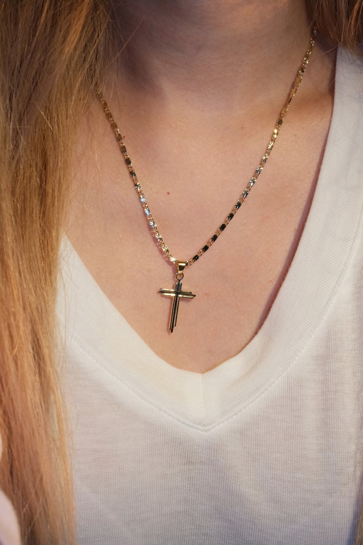 Slim Polished Cross Pendant — Gold — edited real-life photo