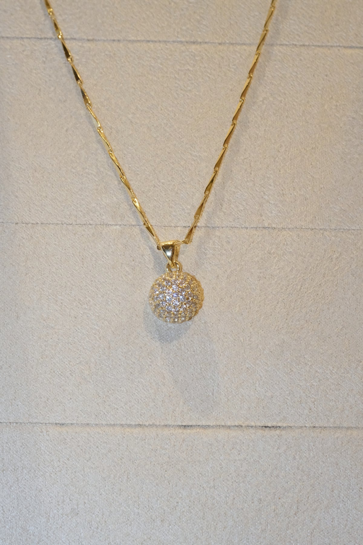 Round Pave Disc Pendant — Gold — edited real-life photo