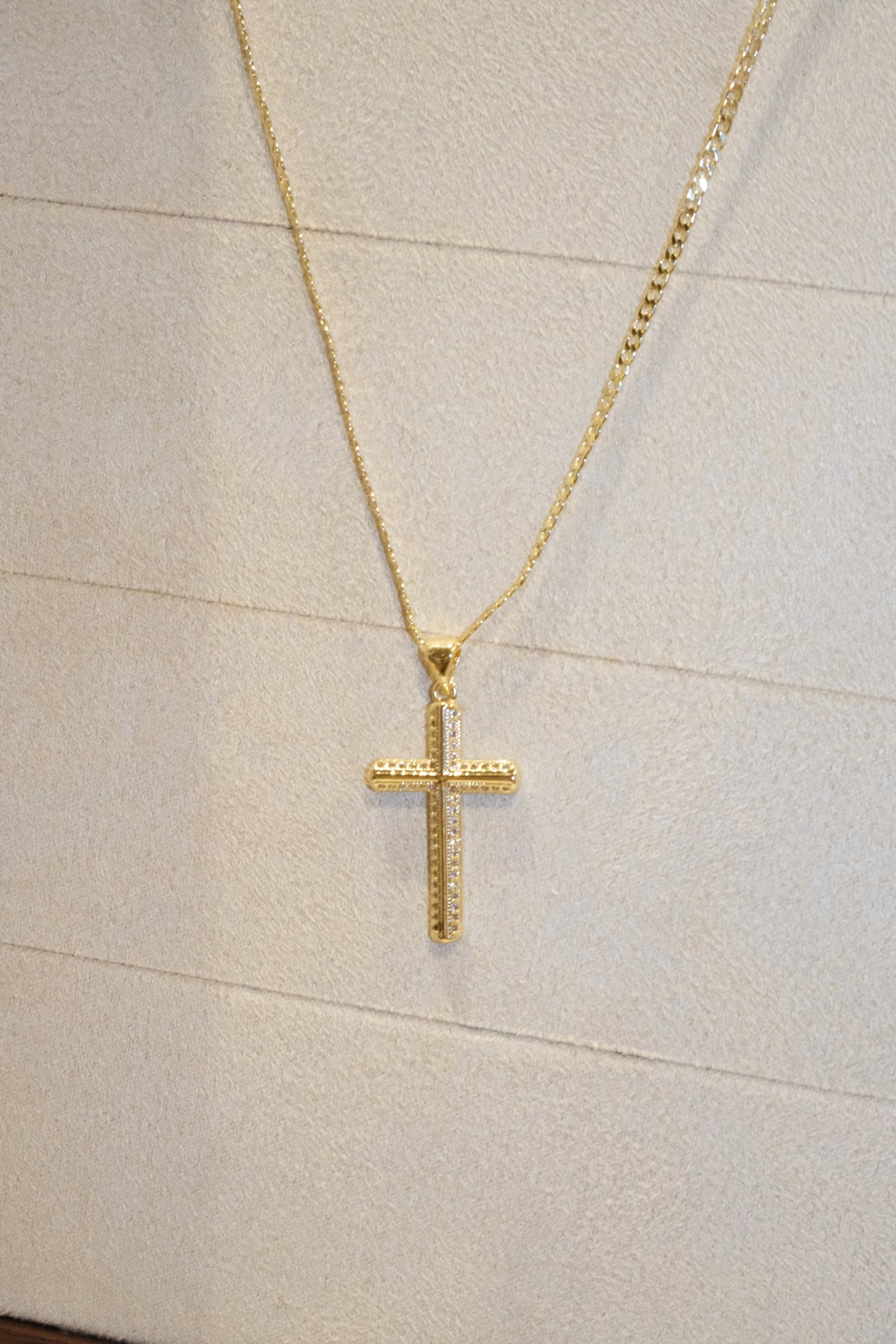 Outlined Cross Pendant — Gold — edited real-life photo