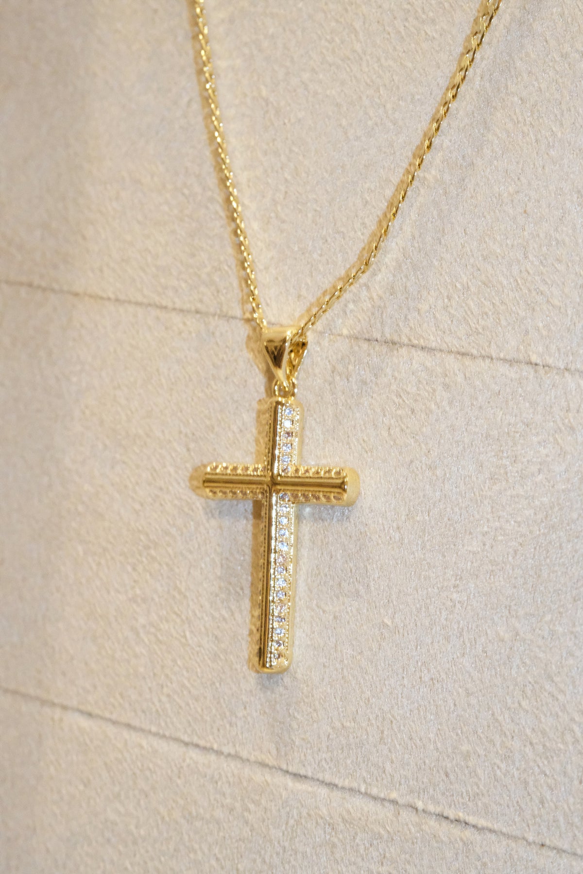 Outlined Cross Pendant — Gold — edited real-life photo