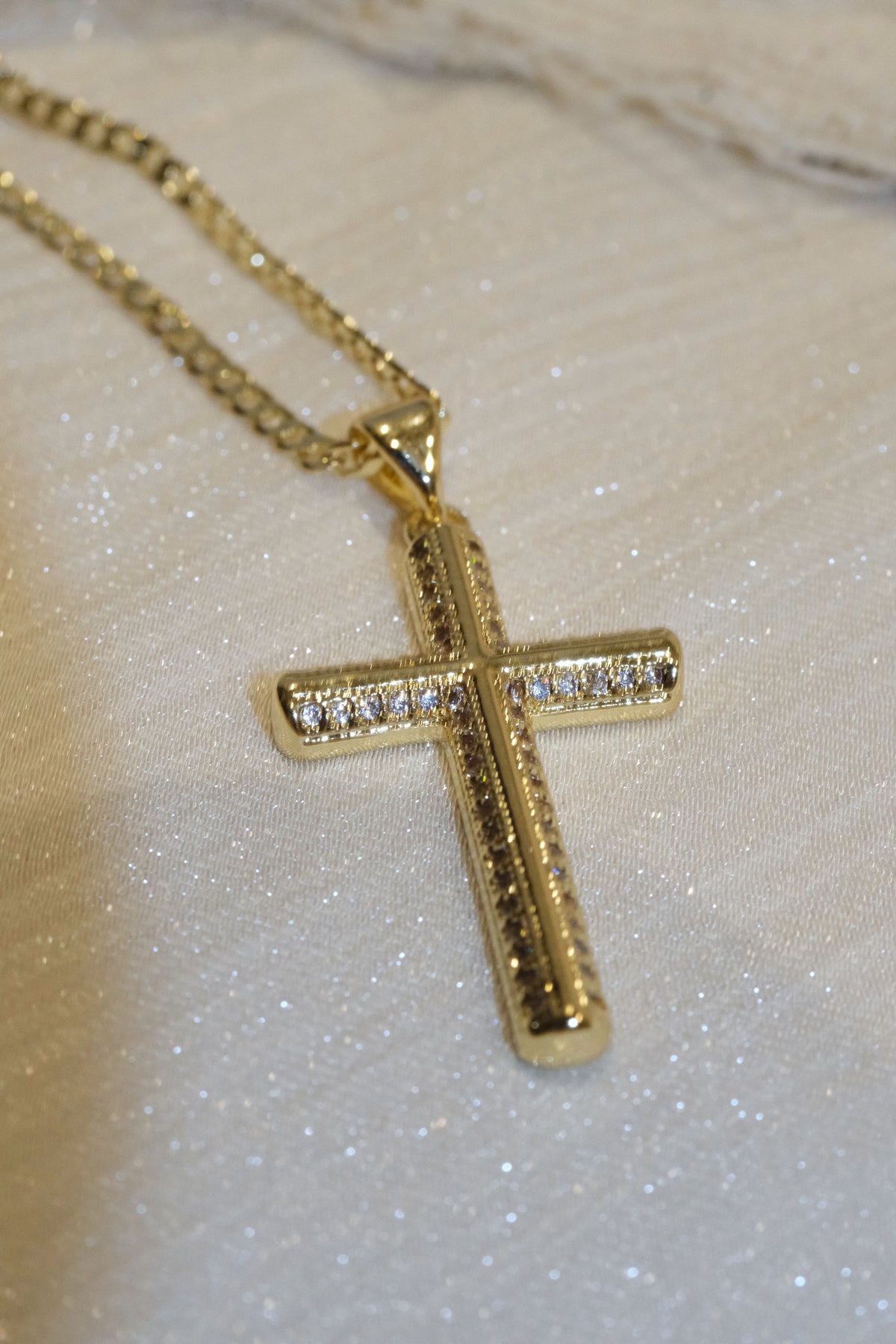 Outlined Cross Pendant — Gold — edited real-life photo
