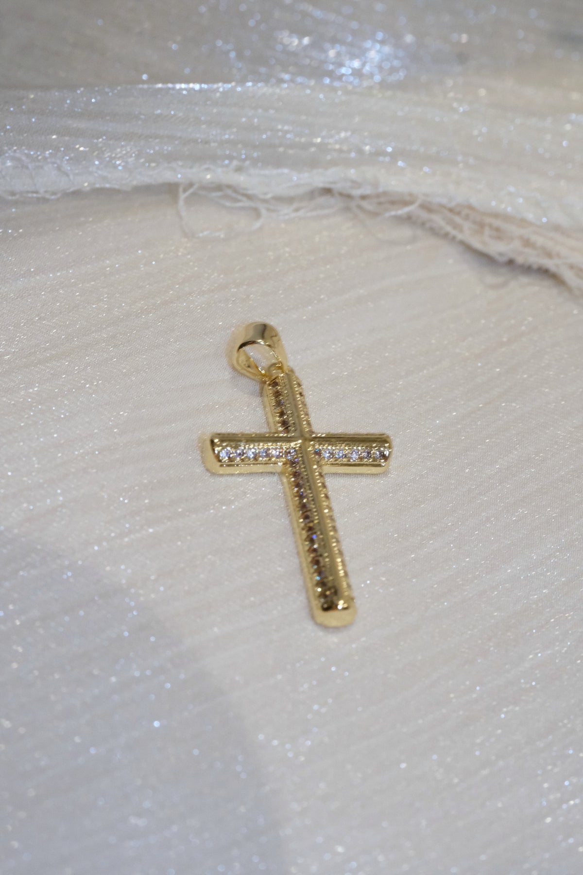 Outlined Cross Pendant — Gold — edited real-life photo