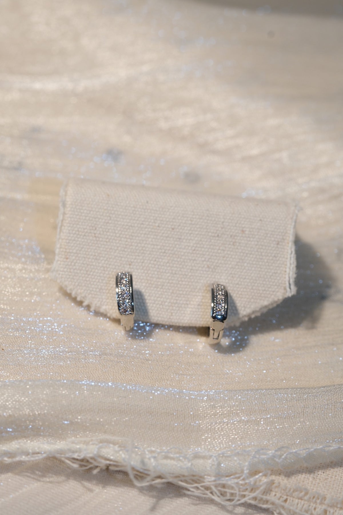 Pave Band Hoop Earrings — Silver — real-life photo