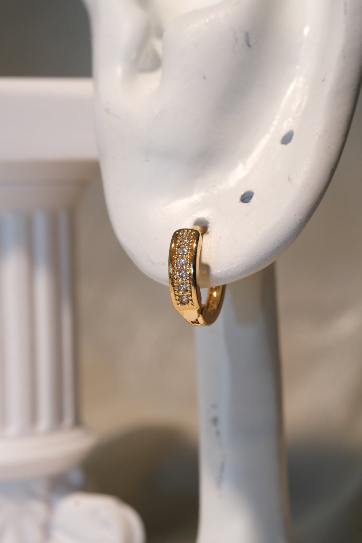 Framed CZ Huggie Earrings — Gold — real-life photo