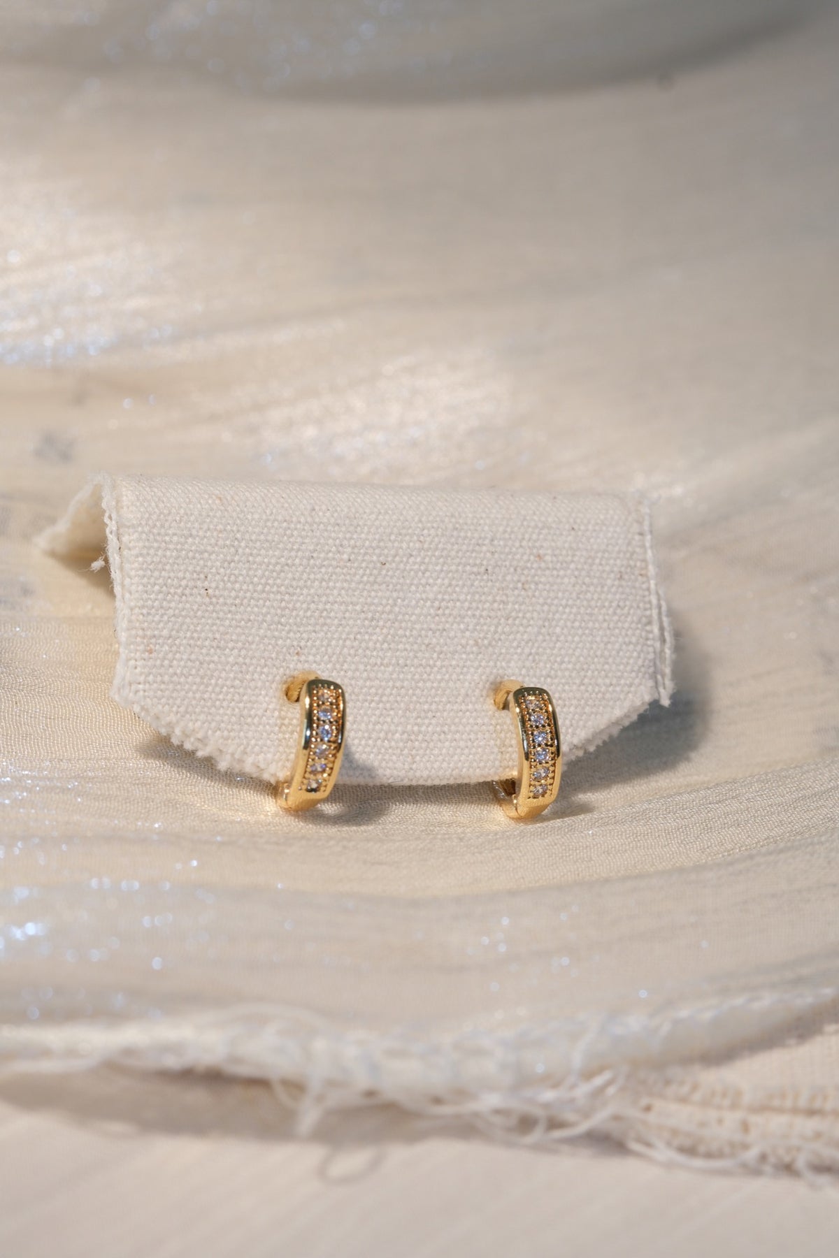Framed CZ Huggie Earrings — Gold — real-life photo