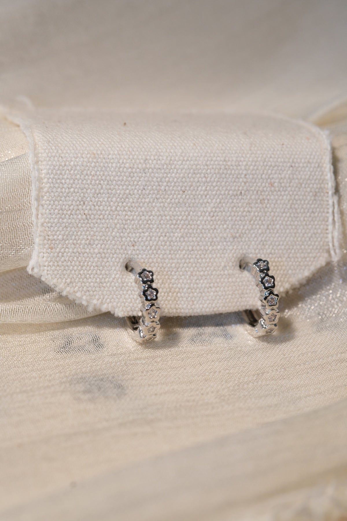 Flower CZ Hoop Earrings — Silver — real-life photo