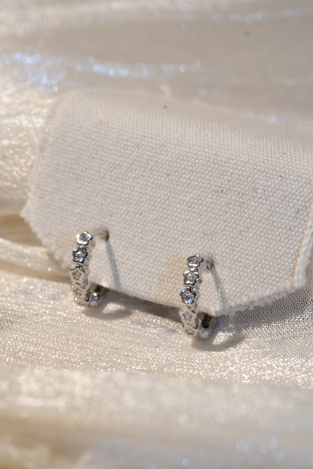 Flower CZ Hoop Earrings — Silver — real-life photo