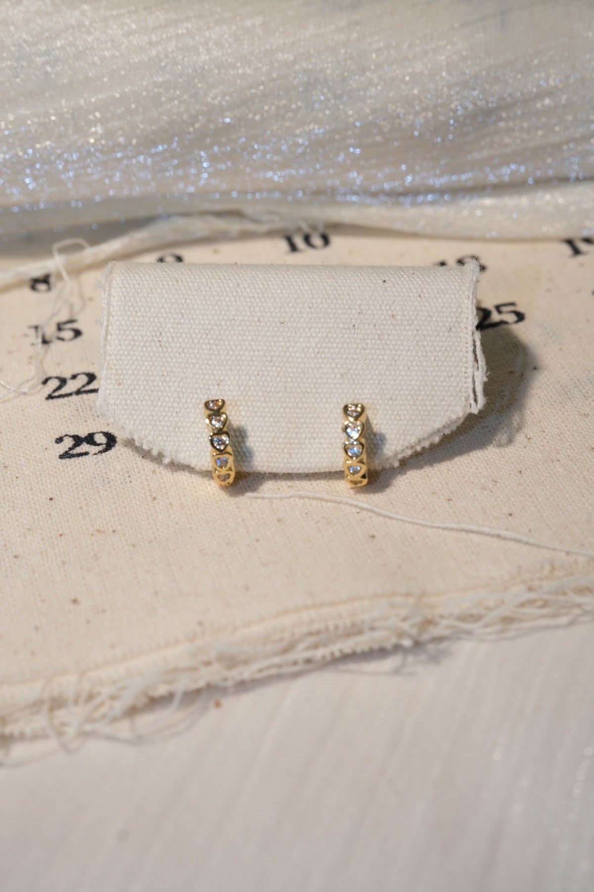 Heart Bezel CZ Hoop Earrings — Gold — real-life photo