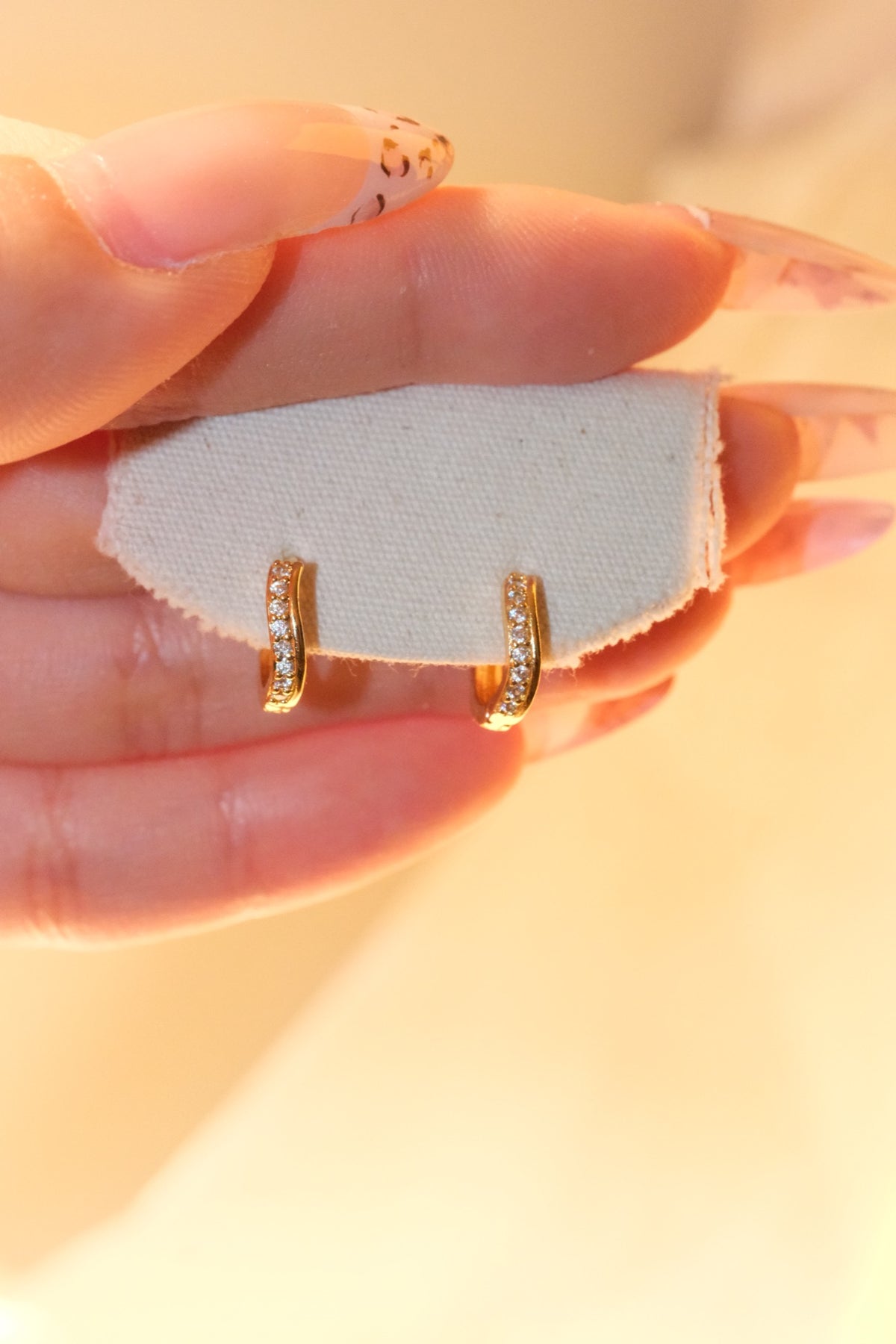 Elongated CZ Hoop Earrings — Gold — real-life photo