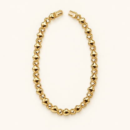 Amour Heart & Crossover Link Bracelet — Gold Tone — white background product photo