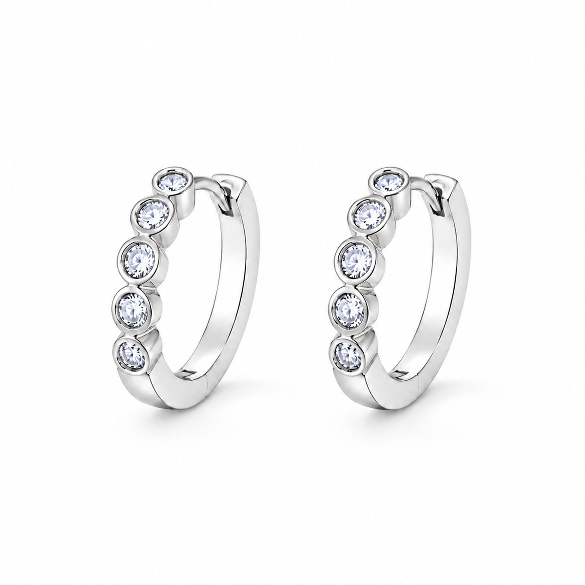 Orbit Five-Stone Bezel CZ Huggie Hoops — white background product photo