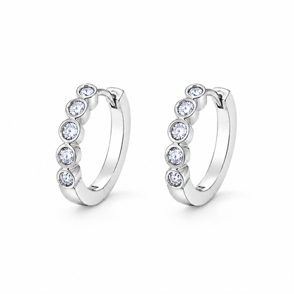 Orbit Five-Stone Bezel CZ Huggie Hoops — white background product photo