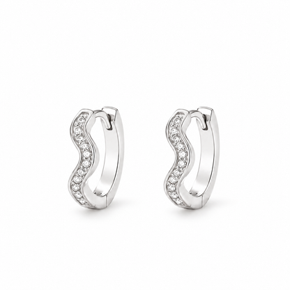 Tide Wave Huggie Hoops — white background product photo