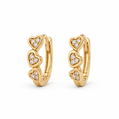 Trio Triple Heart CZ Huggie Hoops — white background product photo