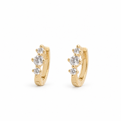 Offset Baguette CZ Huggie Earrings — Gold — white background