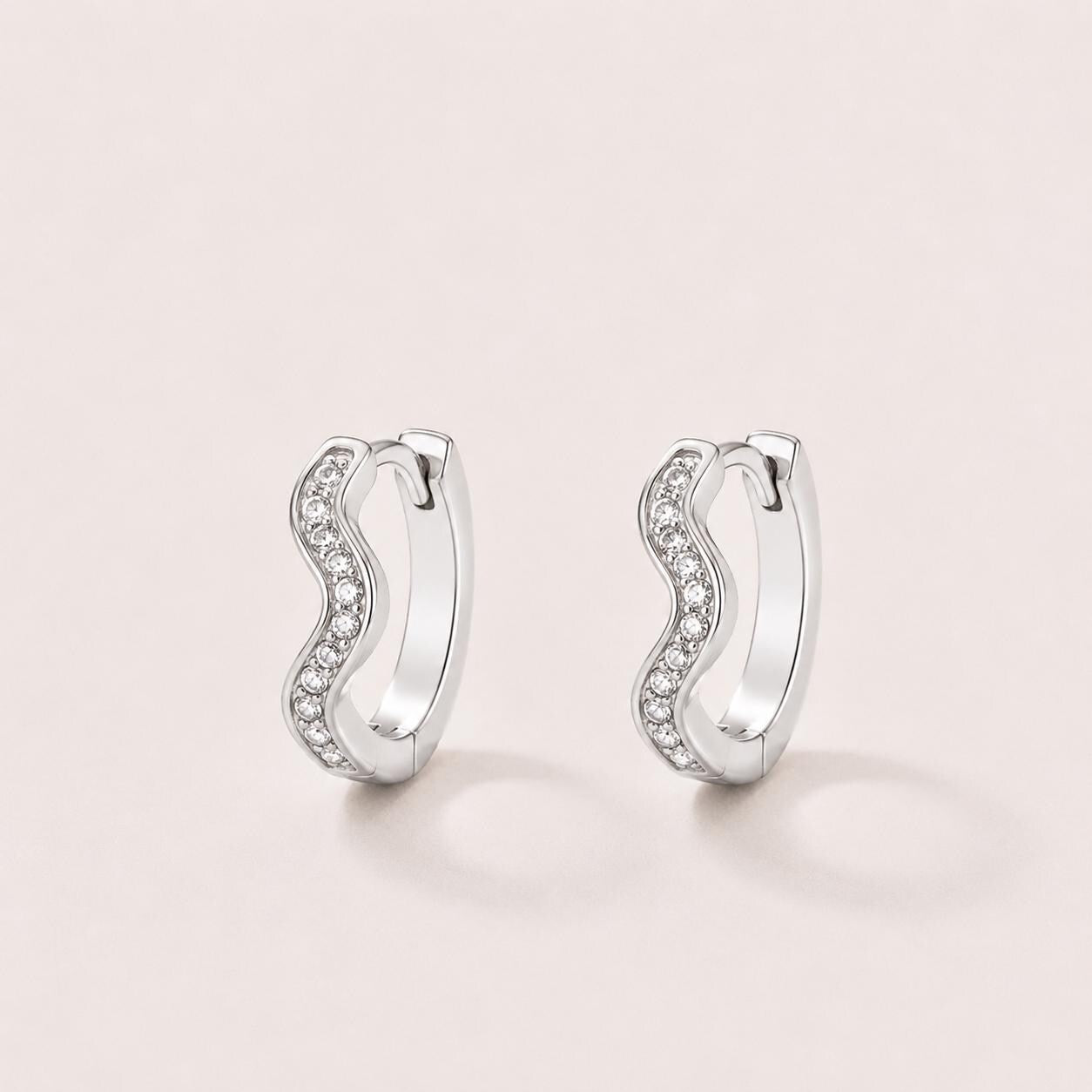 Silver Tone Brass Wavy Pavé Cubic Zirconia Huggie Hoop Earrings – J-59
