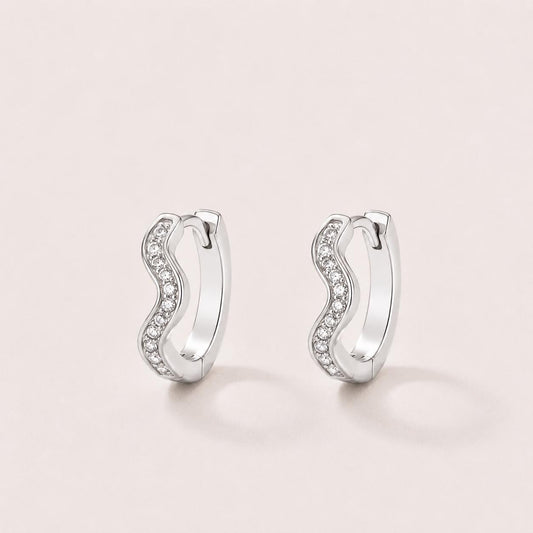 Silver Tone Brass Wavy Pavé Cubic Zirconia Huggie Hoop Earrings – J-59
